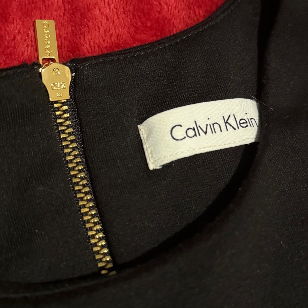 Calvin Klein Black High Low Dress with Sleeveless Design and Crew Neck